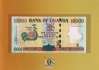 Uganda - 10.000  Shillings im Folder (#048F_UNC)